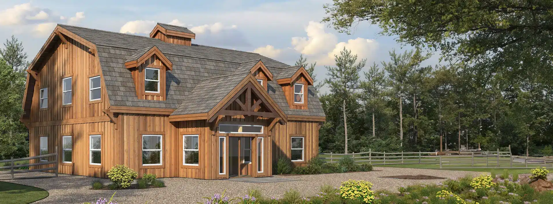 A rustic two-story wooden house with gray shingles, large windows, and a covered entry, surrounded by plants and trees.