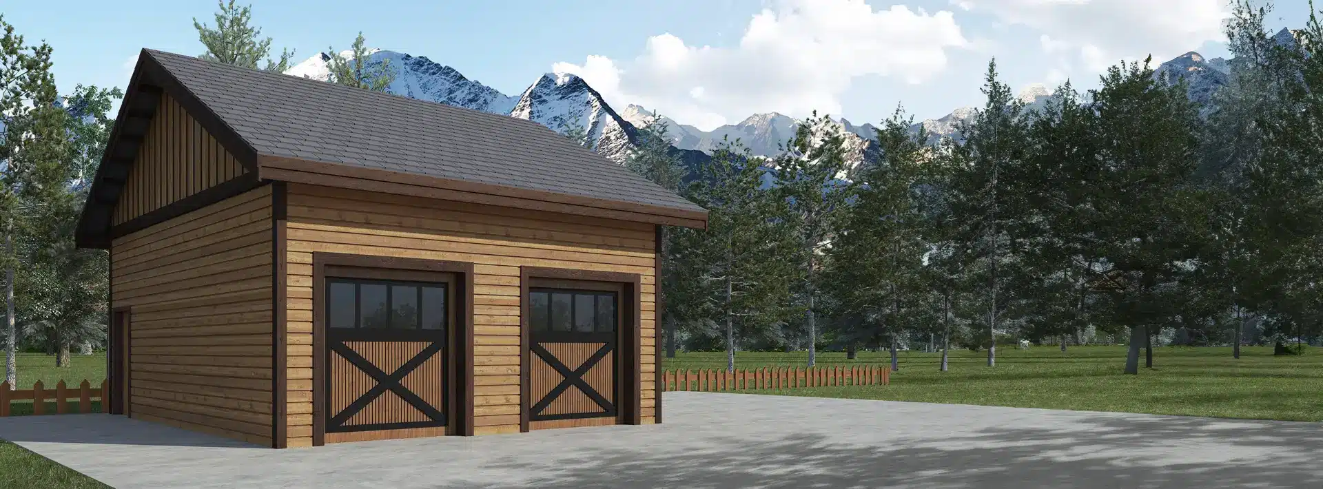 A wooden two-car garage with barn-style doors sits on a concrete driveway, surrounded by trees and mountains under a blue sky.