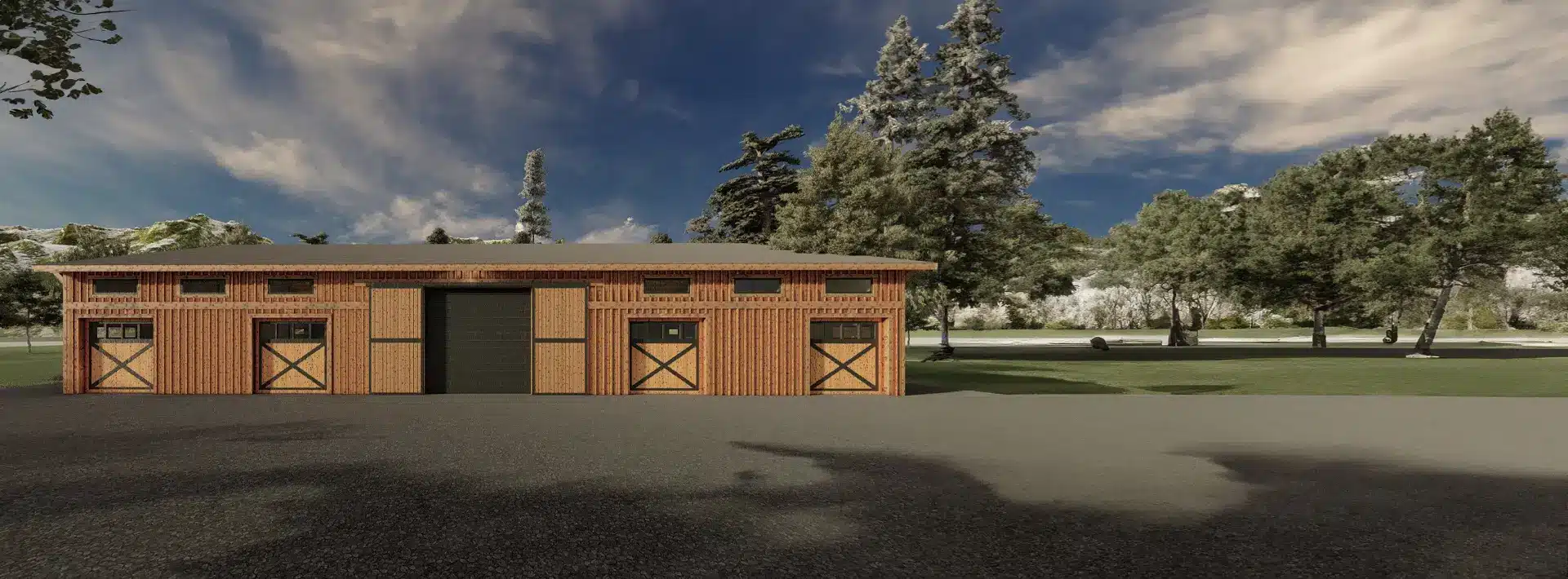 A wooden barn with three large doors stands on a paved area, surrounded by green grass and tall trees under a partly cloudy blue sky.