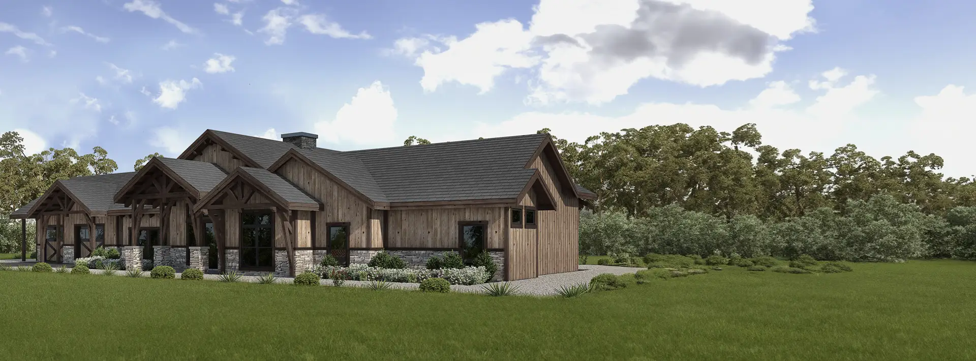A rustic wooden house with stone accents sits on a lush green lawn, surrounded by dense trees under a partly cloudy sky. Shrubs and landscaping line the front.
