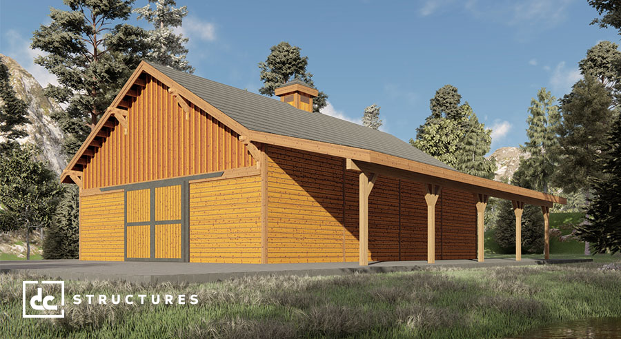 A wooden barn with a gabled roof stands amidst a grassy area, surrounded by pine trees and mountains in the background. The barn features large closed doors and an open side porch. The sky is clear and sunny.