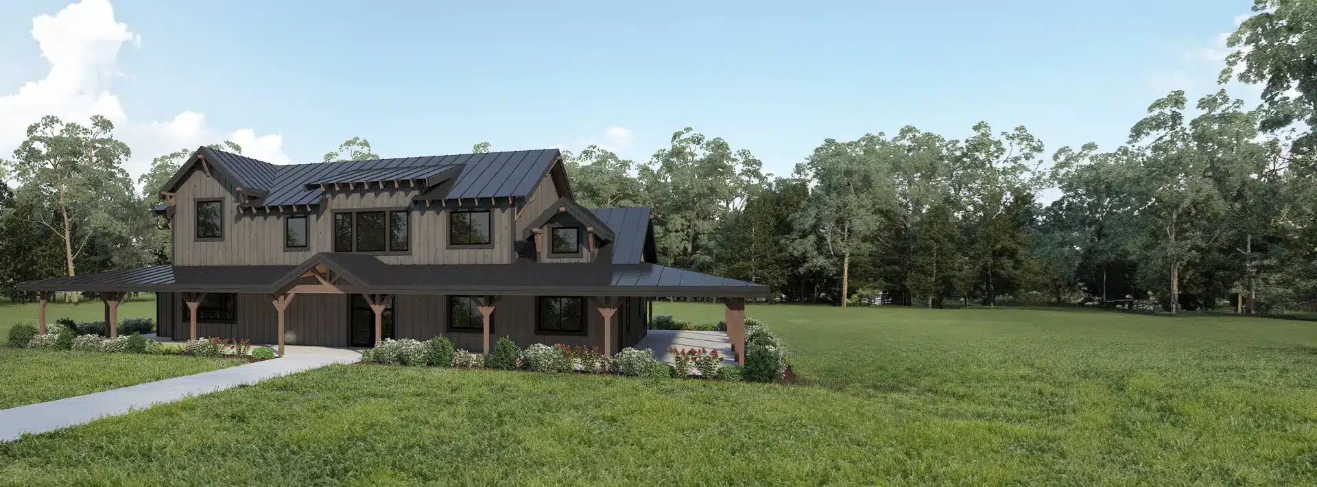 A modern two-story barn-style house with a black metal roof and large windows sits on a green lawn, surrounded by trees.