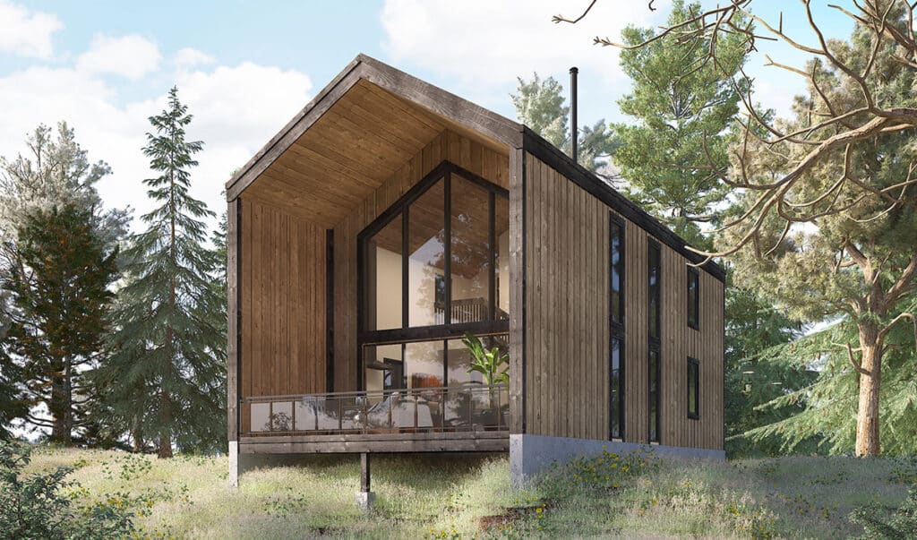 A modern a-frame, two-story wooden cabin with large glass windows stands amidst a lush forest. The house features a slanted roof, a glass-walled balcony, and is elevated on a concrete base. Tall pine trees surround the cabin, creating a serene, natural setting.