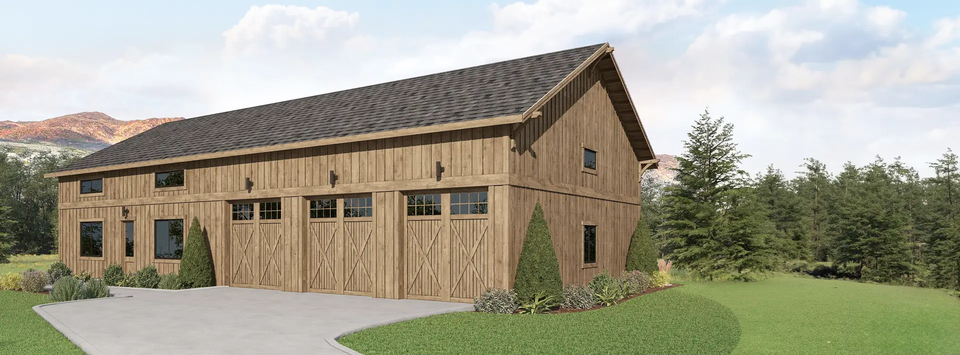 A large wooden barn-style garage with three carriage doors and multiple windows, surrounded by grass, shrubs, trees, and hills.