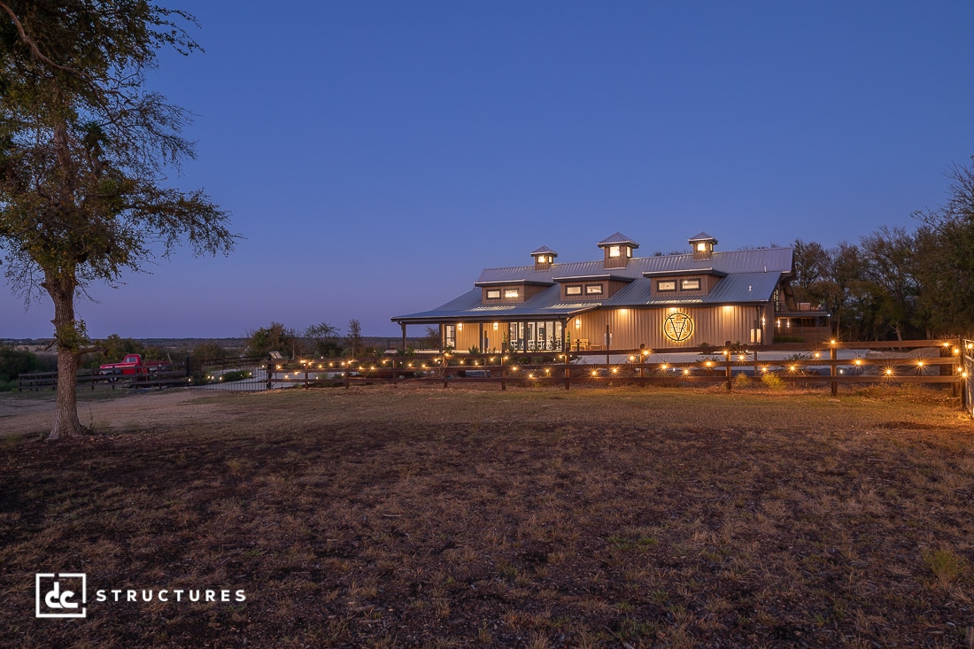A large building with lights on the side.