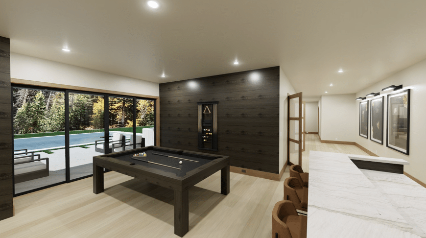 A modern game room with a black pool table, wall-mounted cue rack, marble bar with stools, large windows to patio and pool, framed art.