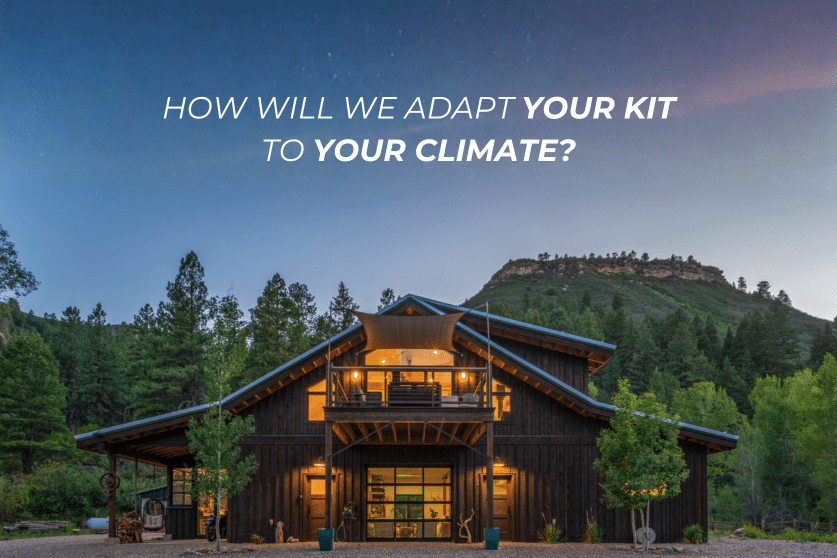 A modern wooden house with large windows and a balcony is surrounded by trees and hills at dusk. The sky is clear with stars.